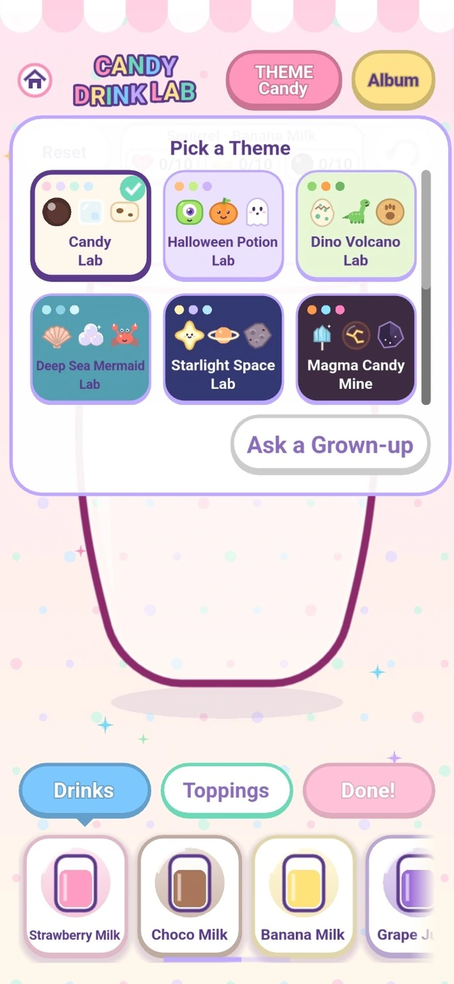 Development build screenshot: the Pick a Theme window with Candy Lab, Halloween Potion Lab, Dino Volcano Lab, Deep Sea Mermaid Lab, Starlight Space Lab and Magma Candy Mine, above a row of drinks to choose from